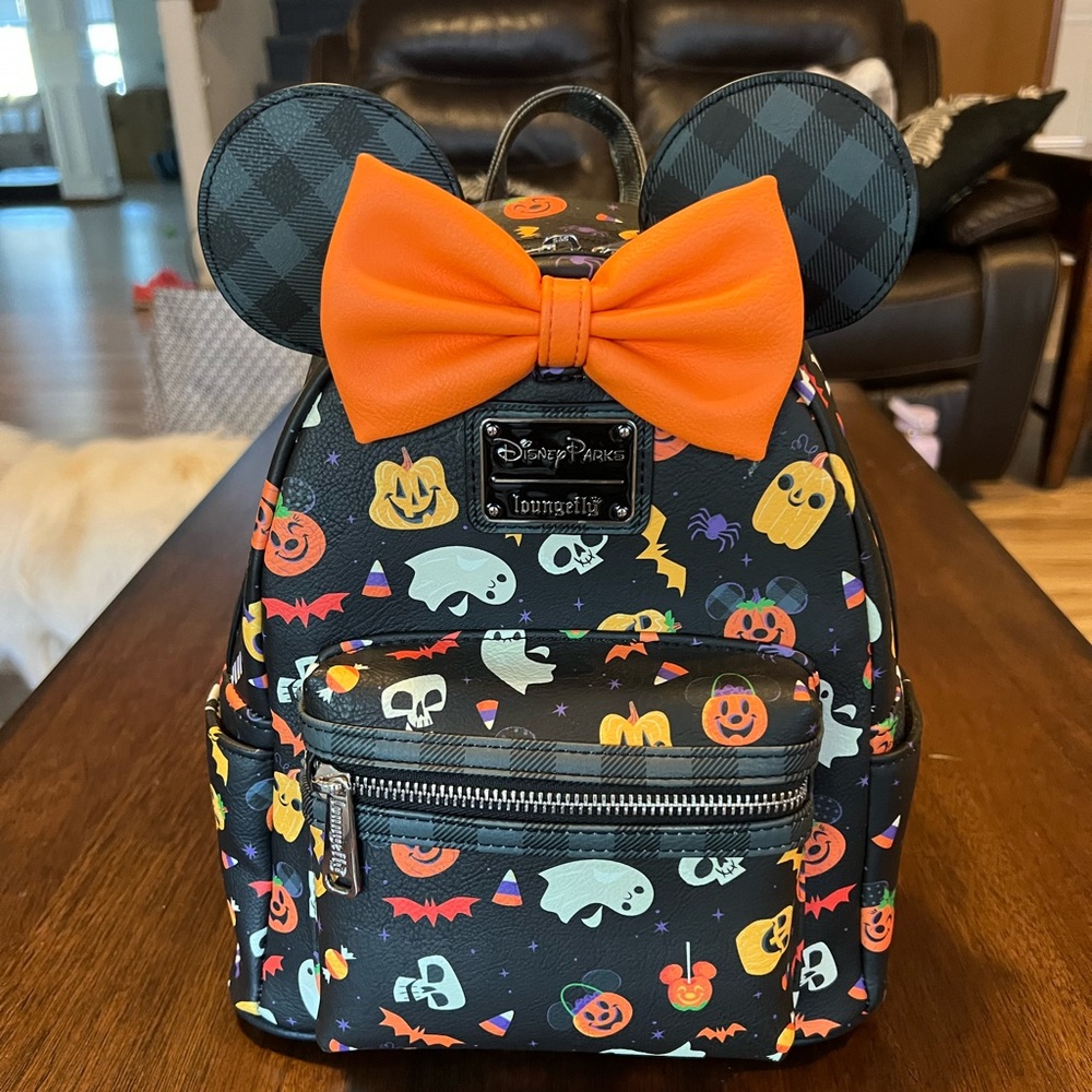 Disney Loungefly Halloween backpack plus Mickey Pumpkin ears.